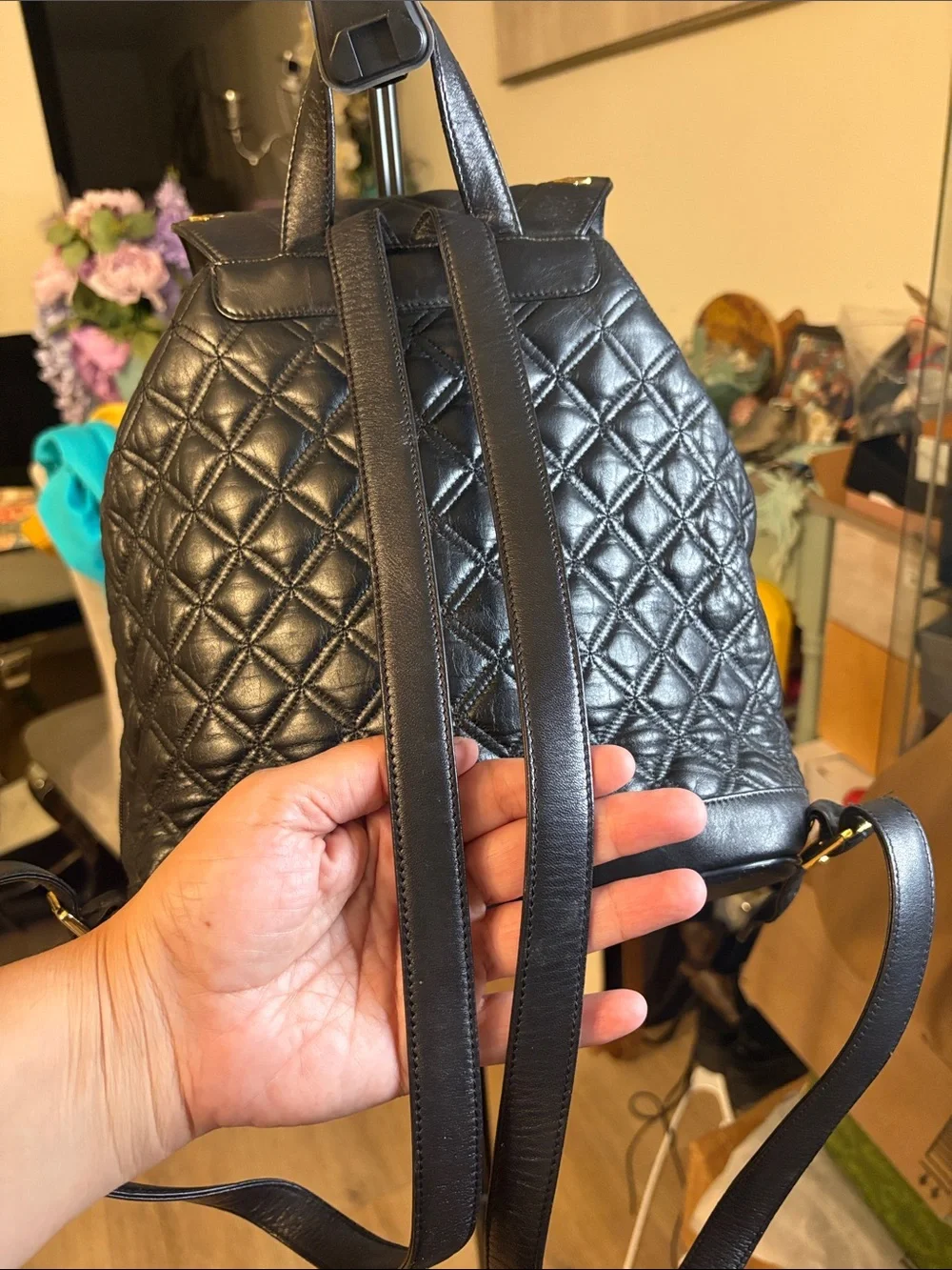 MCM Black Quilted Leather Backpack with Gold Accents